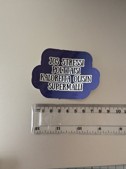 Hauska vinyylitarra läppäriin huumoritekstillä. 