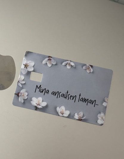 Minä ansaitsen tämän... - Pankkikorttitarra